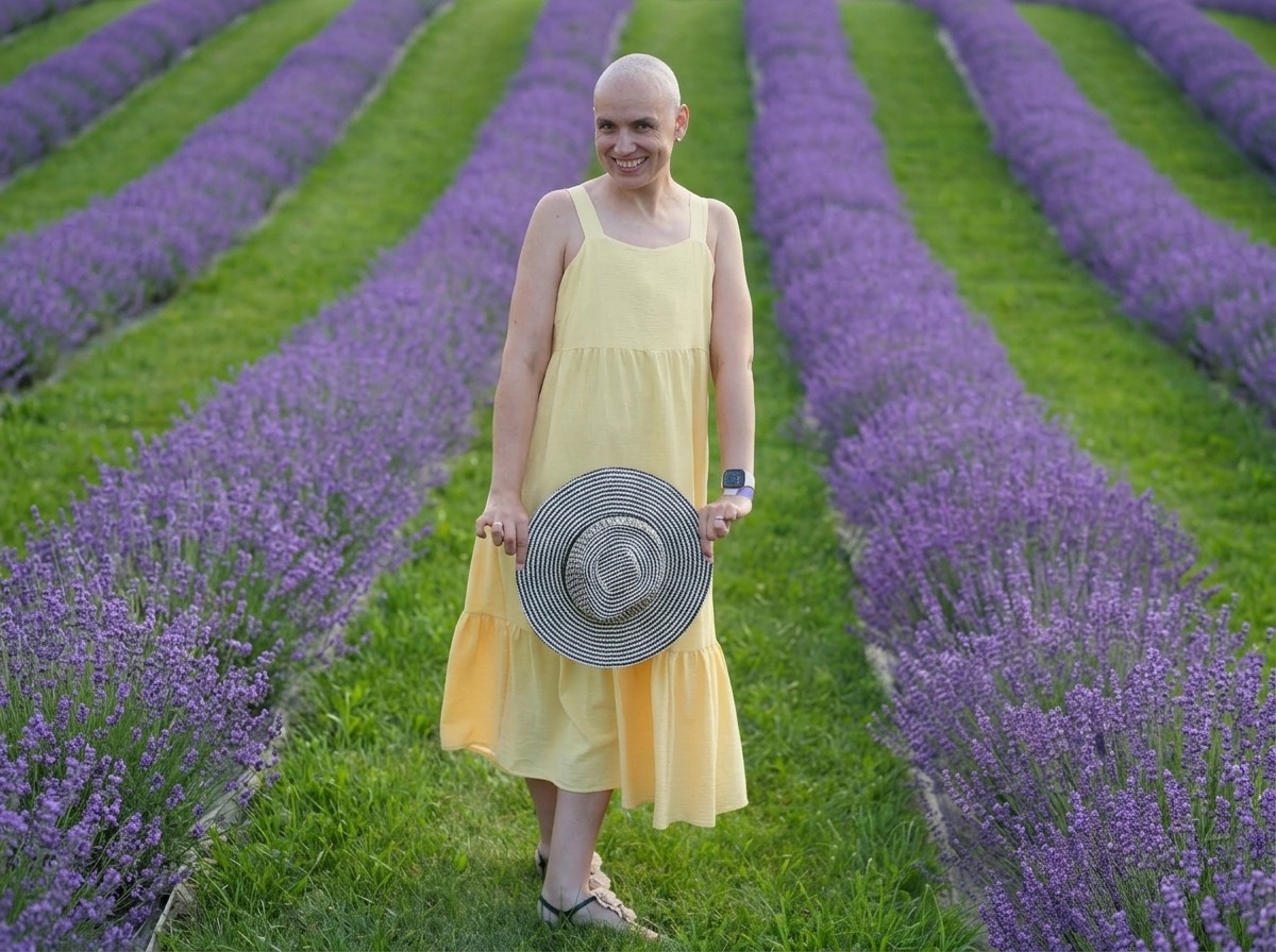Photo: Tetiana Kosenko standing in a field of lavender