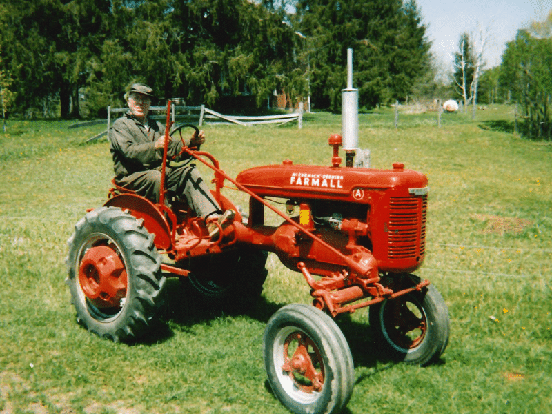 Photo: Edgar Reinhart operating a tractor