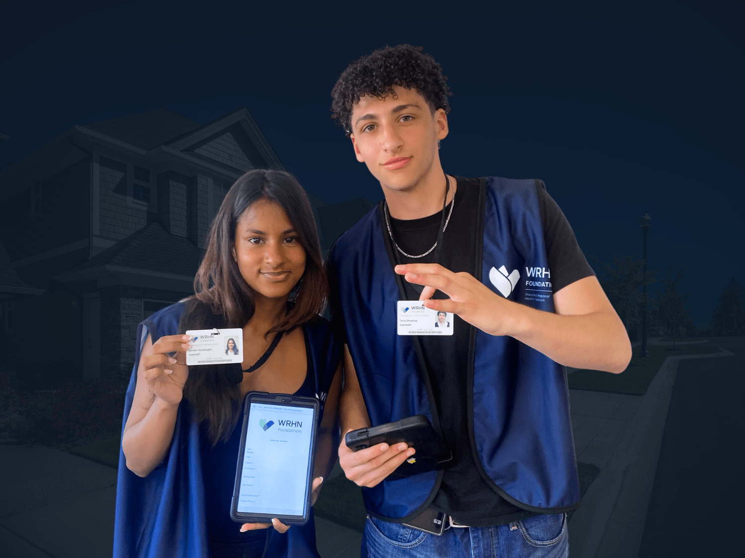 WRHN Foundation representatives wearing a vest, ID badge, and carrying a tablet