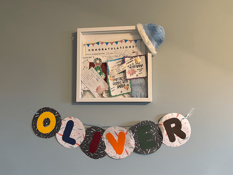 Photo: Oliver's name and keepsakes on the wall