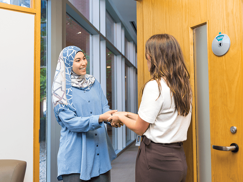 Photo: A WRHN team member greeting a patient