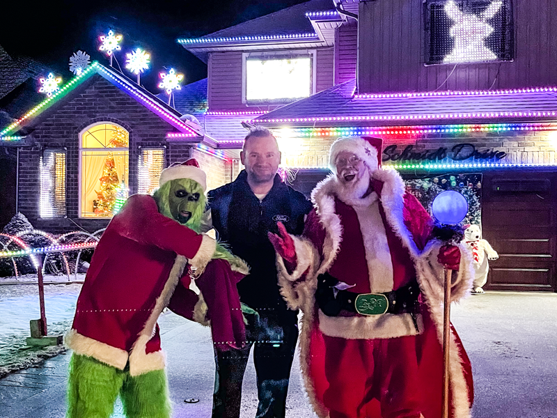 Photo: Change 4 Change lightshow - Scott Tonelli with Santa and the Grinch